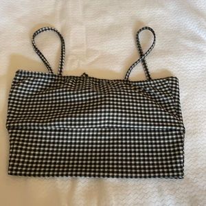 Pretty little thing. Black and white top